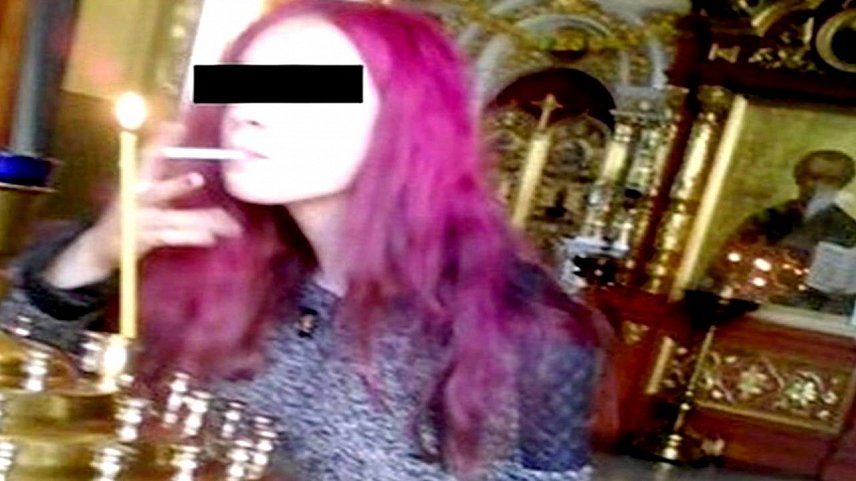В Белгородской области на девушку, прикуривающую сигарету от свечи в храме, завели уголовное дело