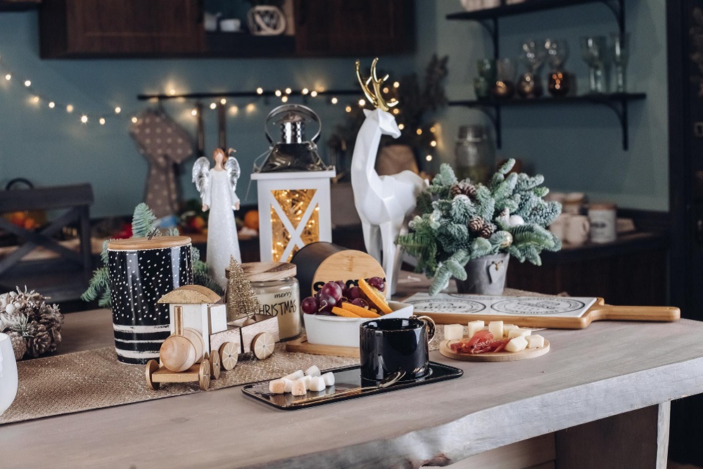 festive-christmas-decoration-table-with-big-cup-of-hot-beverage-with-sugar-and-snack-close-up-cosiness-december-season-decorating-ready-to-coffee-break-at-cozy-room-celebrating-new-year-holiday.jpg